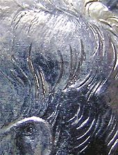 A close-up image detailing the heavily accented hairlines present on early Kennedy half dollar proof issues Kennedy-Half-Dollar-Accented-Hair.jpg