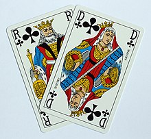 In Belote, a "Belote" is a pair of a King and a Queen of the trump suit: it must be declared when the first is played King and Queen of Clubs.jpg