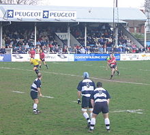 Manchester, in red, kick off for the last match at the ground. The Main Stand is in the background. Last day at coundon kickoff.jpg