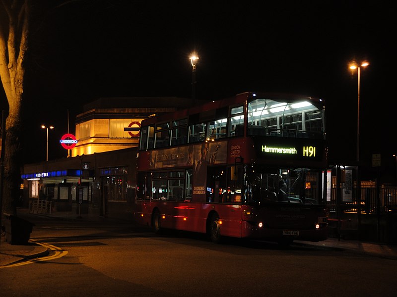 File:London United SP198 YR10 FGE and Hounslow West tube station.JPG