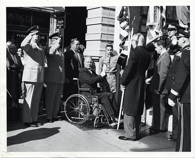 File:Mayor John F. Collins raises a flag (13561123795).jpg