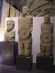 in the 1st century CE celtic peoples in the north of portugal built statues of deified local heroes which stood as guardians over hill forts MuseuNacArqu-GuerreirosLusitanos.jpg