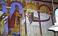 Næste del af kalkmalerierne, der forestiller den sidste konge og Jesu fødslen (i dag tolket som Zacharias, der skriver Johannes' navn og Johannes' fødsel).[16]