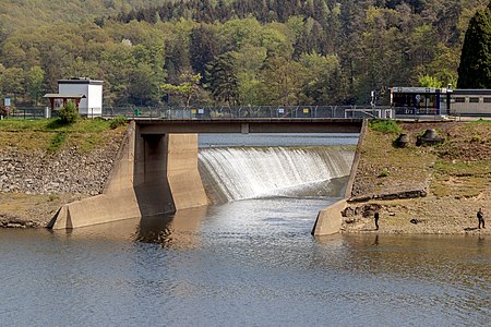 Paulushofdamm with the free overfall weir Rurberg Germany