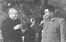 Following the Korean War, Peng rose in prominence and is here seen welcoming Kim Il Sung to Beijing in 1955. Peng Dehuai welcomes Kim Il-sung.jpg