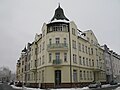 Apartment building in a corner location in a closed development