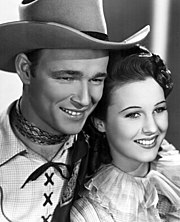 Roy Rogers and Mary Hart in Shine On, Harvest Moon (1938) Roy Rogers - Hart - 1938.jpg