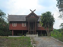 Rumah Betang, a traditional Ma'anyan house in Muara Bagok, East Barito Regency, Central Kalimantan. Rumah Betang Muara Bagok.jpg