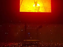 West seen on the "floating" main stage with the secondary stage shining down above him. Saint Pablo Tour - Chicago.jpg