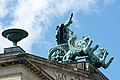 Deutsch: Apollo im Greifenwagen von Christian Friedrich Tieck auf dem Giebel des Schauspielhauses in Berlin-Mitte. This is a photograph of an architectural monument. It is on the list of cultural monuments of Berlin, no. 09065015.