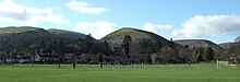 Church Stretton v Newport in the 2011-12 season, at Russell's Meadow - fixed posts around the pitch and dugouts are ground requirements for teams in the Premier Division. Stretton Newport 25 Feb 2012.JPG