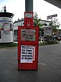 Bild-Zeitungsautomat mit Händlerschürze