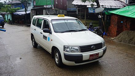 White Toyota or Nissan wagons are the ubiquitous taxi model in Yangon