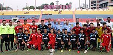 Minerva players (in black) at the 59th edition of Subroto Cup, at the Dr. B.R. Ambedkar Stadium in New Delhi, October 2018. The Air Officer-in-Charge Administration, Air Marshal H.N. Bhagwat at the inauguration of the 59th Edition of Subroto Cup International Football Tournament, at Dr. B.R. Ambedkar Stadium, in New Delhi on October 25, 2018.JPG