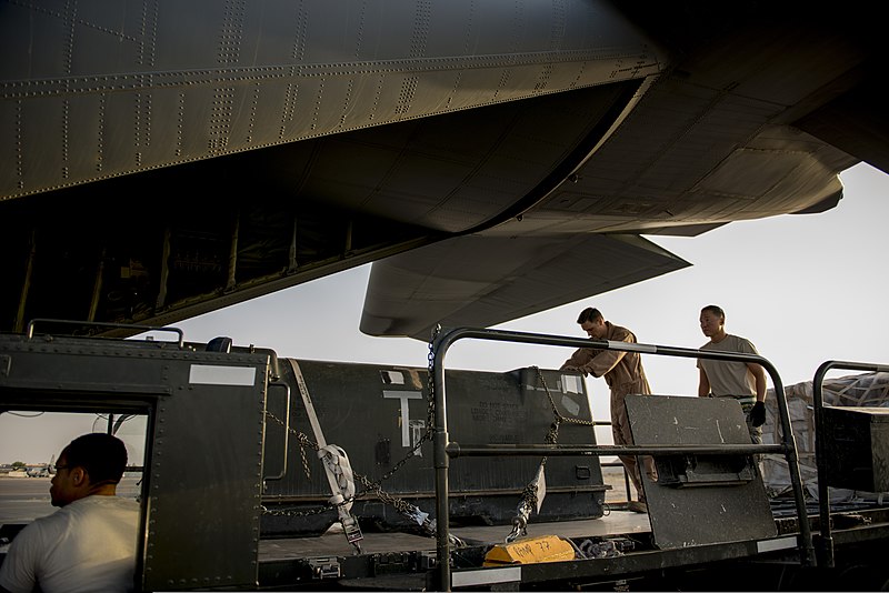 File:U.S. Air Force Staff Sgt. Johnny Bond, a loadmaster with the 737th Expeditionary Airlift Squadron, and Senior Airman Chris Park, with the 386th Expeditionary Logistics Readiness Squadron, load cargo onto 140629-F-FW757-258.jpg