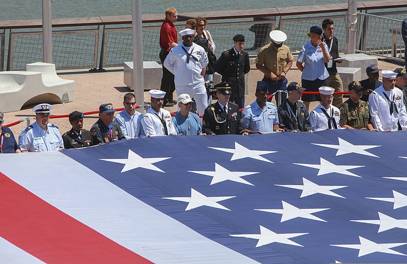 File:U.S. Service members and veterans gather around a U.S. flag during a Memorial Day celebration at the Intrepid Sea, Air and Space Museum in New York May 27, 2013 130527-M-DO926-012.jpg