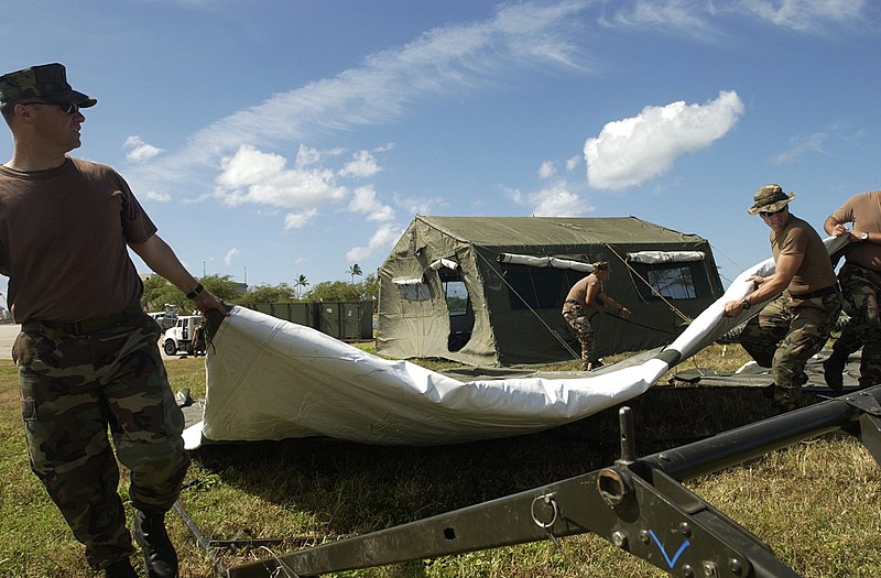 File:US Navy 040714-N-6811L-033 Navy Divers assigned to Mobile Diving Salvage Unit One (MDSU-1) assemble a tent during a field exercise.jpg