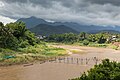 Working at the consolidation of a wooden footbridge in Luang Prabang - 1 (Side view).jpg