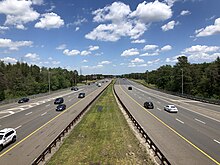 The northbound Garden State Parkway at CR 528 in Lakewood 2021-05-27 12 50 22 View north along New Jersey State Route 444 (Garden State Parkway) from the overpass for Ocean County Route 528 (Cedar Bridge Avenue) in Lakewood Township, Ocean County, New Jersey.jpg