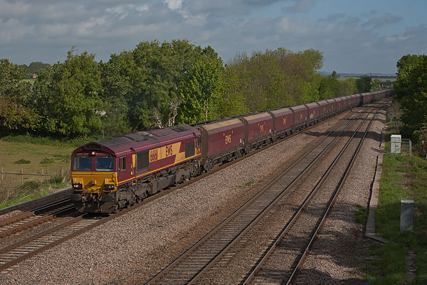 EWS liveried Class 66 and coal wagons near Tupton, Derbyshire in May 2011