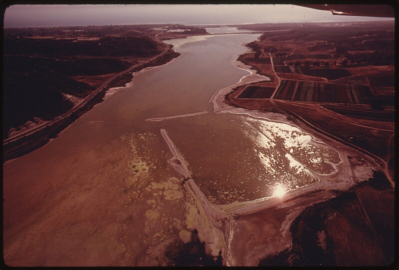 File:AERIAL OF BOTAQUITO LAGOON, ONE OF THE LAST FEW BODIES OF WATER OF THIS TYPE IN THE SOUTHERN PART OF THE STATE. IT... - NARA - 557506.jpg