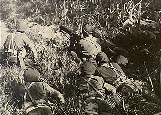 A machine-gun crew from the 37th/52nd Battalion in New Guinea, 1944 AWM 073832 Australian 37th 52nd Infantry Battalion New Guinea 1944.jpg