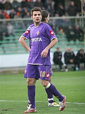 Mutu with Fiorentina during their 2007-08 season. Adrian Mutu Roberto Vicario.jpg