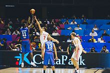 The men's national team (blue) playing against Croatia (white) at the 2014 FIBA World Cup Andray Blatche World Cup 2014.jpg