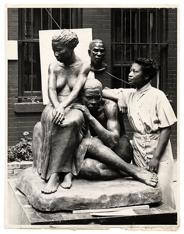 Augusta Savage with Realization, her WPA Federal Art Project, 1938.