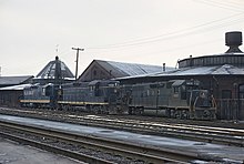 B&O engines alongside the shops in Martinsburg, W.Va. on March 2, 1969 B&O 3820, 6532, and 1834 (GP38, GP9, and SD9) Martinsburg, W.Va. on March 2, 1969 (22511089052).jpg