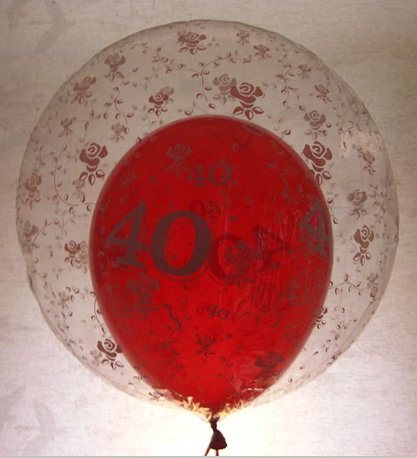The air-filled red balloon acts as a simple ballonet inside the outer balloon, which is filled with lifting gas.