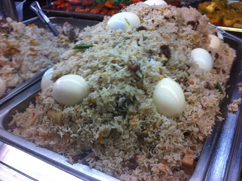 "Biryani_with_hard‐cooked_eggs.jpg" by User:Vensatry