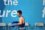 Deutsch: Boxen bei den Olympischen Jugendspielen 2018 Tag 12, 18. Oktober 2018 - Finale im Leichten Weltergewicht Jungen – Ilia Popov (Russland, rot) schlägt Talgat Shaiken (Kasachstan, blau) 4-1; Ringrichter ist James Beckles (Trinidad und Tobago). English: Boxing at the 2018 Summer Youth Olympics on 18 October 2018 – Final Light Welterweight Boys Bout - Ilia Popov (Rusia, rojo) supera a Talgat Shaiken (Kazajstán, azul) 4-1; Referee is James Beckles (Trinidad and Tobago). Español: Boxeo en los Juegos Olímpicos Juveniles de Verano de 2018 en 18 de octubre de 2018 - Chicos de peso welter ligero final: Ilia Popov (Uzbekistán, roja) le gana a Talgat Shaiken (Egipto, azul) 4-1; El árbitro es James Beckles (Trinidad y Tobago).