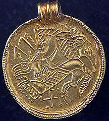 Bracteate G 205 (ca. 5th to 7th century), bearing the inscription alu. Brakteat von Djupbrunns.jpg