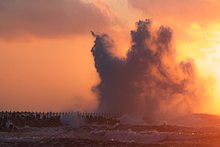 Breaking wave at pier at sunset, Nørre Vorupør, Denmark, 2015-07-09-5617.jpg