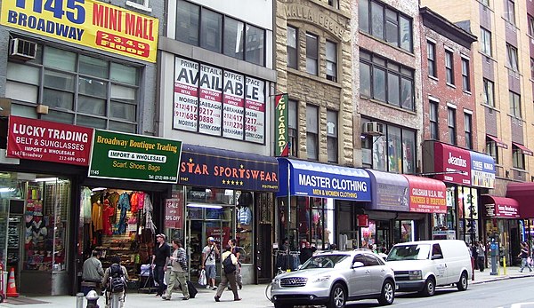 Parts of Broadway in NoMad, such as this block between 26th and 27th Streets, are full of small "wholesale" import shops.