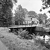 Fraeylemaborg 06 Fraeylemaborg, houten brug op jukken over buitengracht, voorzien van ijzeren balusterleuningen