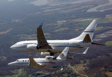 C-38A (G100) and Boeing C-40 Clipper of the United States Air National Guard C-38A and C-40C DC ANG in flight.jpg