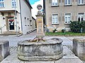 Brunnen mit Pflasterung