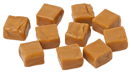 Milk caramel manufactured as square candies, either for eating or for melting down