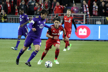 Delgado defending Kaka in match against Orlando City Delgado and Kaka.png