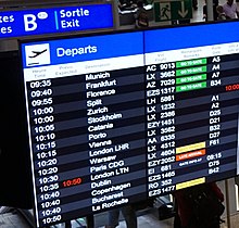 This board at Geneva Airport shows airline codes including AC (Air Canada), LX (Swiss) and AZ (ITA Airways).