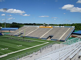 Original grandstand of Memorial Stadium in 2014 at Dix Stadium as the north end zone seats Dix Stadium North.JPG