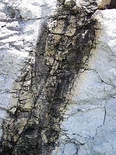 <span class="mw-page-title-main">Dolomitization</span> Geological process producing dolomite