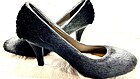 High heels with dyed-black harp seal fur by Nicole Camphaug