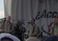 From left to right: singer Jerry Rivas, musical director Rafael Ithier and singers Charlie Aponte and Luis "Papo" Rosario the first song of gran combo was tingoli