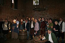 Presenter Richard Hammond and director Mike Slee with the cast and crew of the 2005 production The Gunpowder Plot: Exploding The Legend, filmed on location at Kentwell Hall. Exploding the Legend cast and crew.jpg