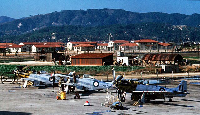 F-51Ds of RAAF No. 77 Squadron in maintenance at Iwakuni Airfield, June 1950.