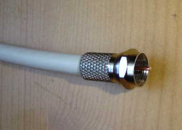 A coaxial television network cable with an F-type connector