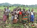 A family in a rural area of Mozambique, with multiple children.